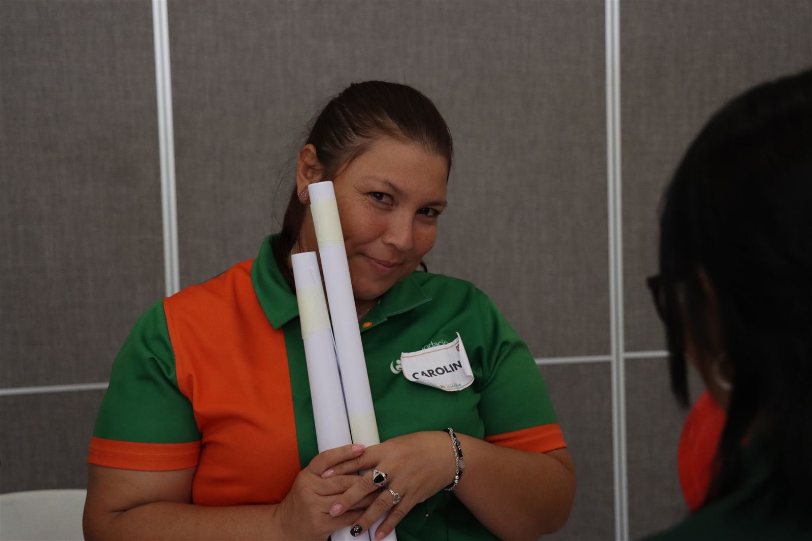 Participante durante el taller de atención al cliente.